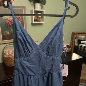 Blue romper with tie in the back